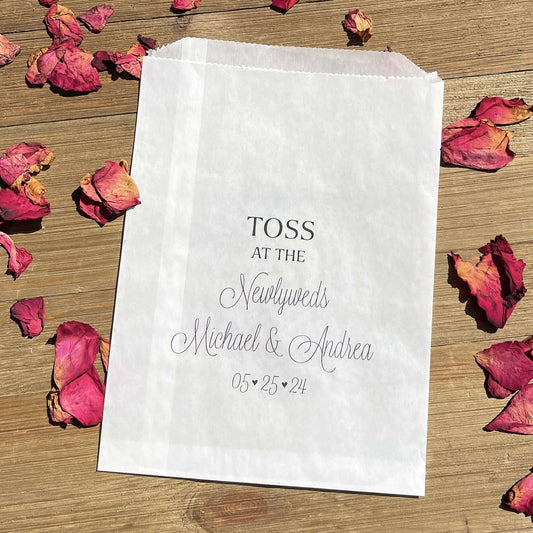 Wedding Petal Toss Bags Personalized  for the bride and groom.  Printed on glassine bags for an elegant touch.  Fill with rose petals, confetti,  flower petals, lavender or rice. Toss at the newlyweds when they exit.