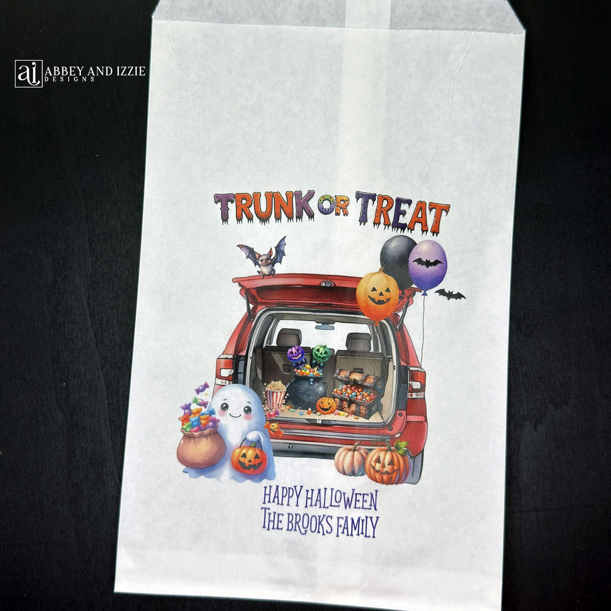 Personalize your trunk-or-treat celebration bags, make each trick-or-treater feel special. These durable, treat bags feature 'Happy Halloween' and your names, perfect for neighborhood events, school celebrations, or family gatherings.  Printed on white paper bags with Trunk or Treat at the top, a car with back open for the event.  Filled with cute Halloween decorations.  