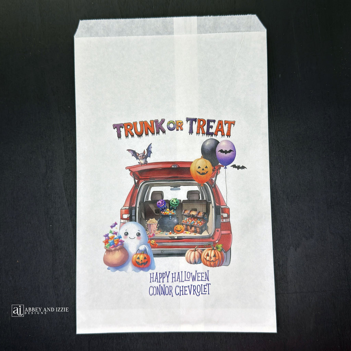 Personalize your trunk-or-treat celebration bags, make each trick-or-treater feel special. These durable, treat bags feature 'Happy Halloween' and your names, perfect for neighborhood events, school celebrations, or family gatherings.  Printed on white paper bags with Trunk or Treat at the top, a car with back open for the event.  Filled with cute Halloween decorations.  