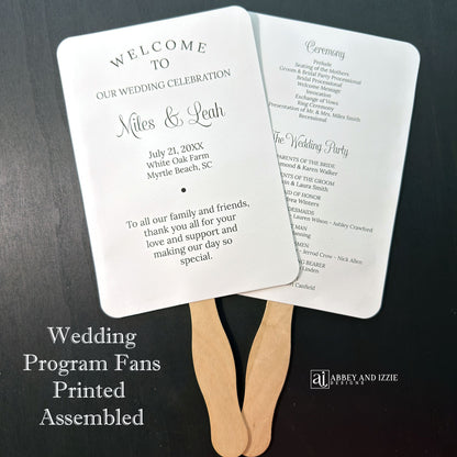 Wedding program fans printed with names, date, a thank you plus your ceremony order and the wedding party.  Fans are printed and shipped to you assembled for your special day.  Printed on white cardstock with black text, rounded corners with a wooden handle hidden between the two layers of cardstock.