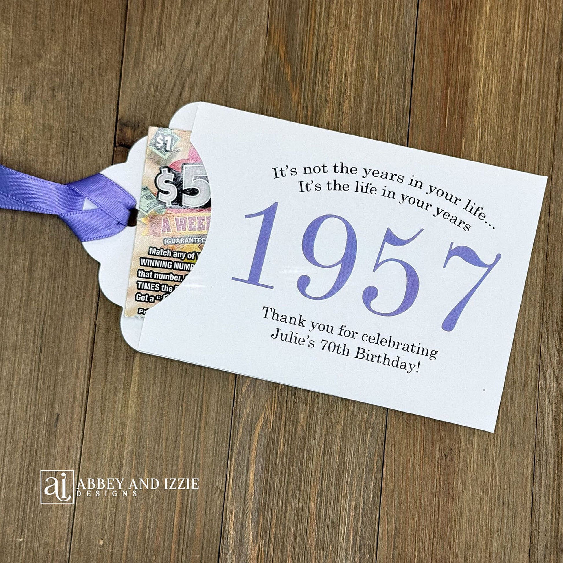 Personalized scratch-off birthday favors for adults. Each envelope features a special message with the year the guest of honor was born in color. Including a thank you for celebrating with the us. Works for milestone birthdays, adult parties, and special events see our store for more options. Constructed from white high-quality cardstock with your choice of year color and ribbon color, which comes attached.