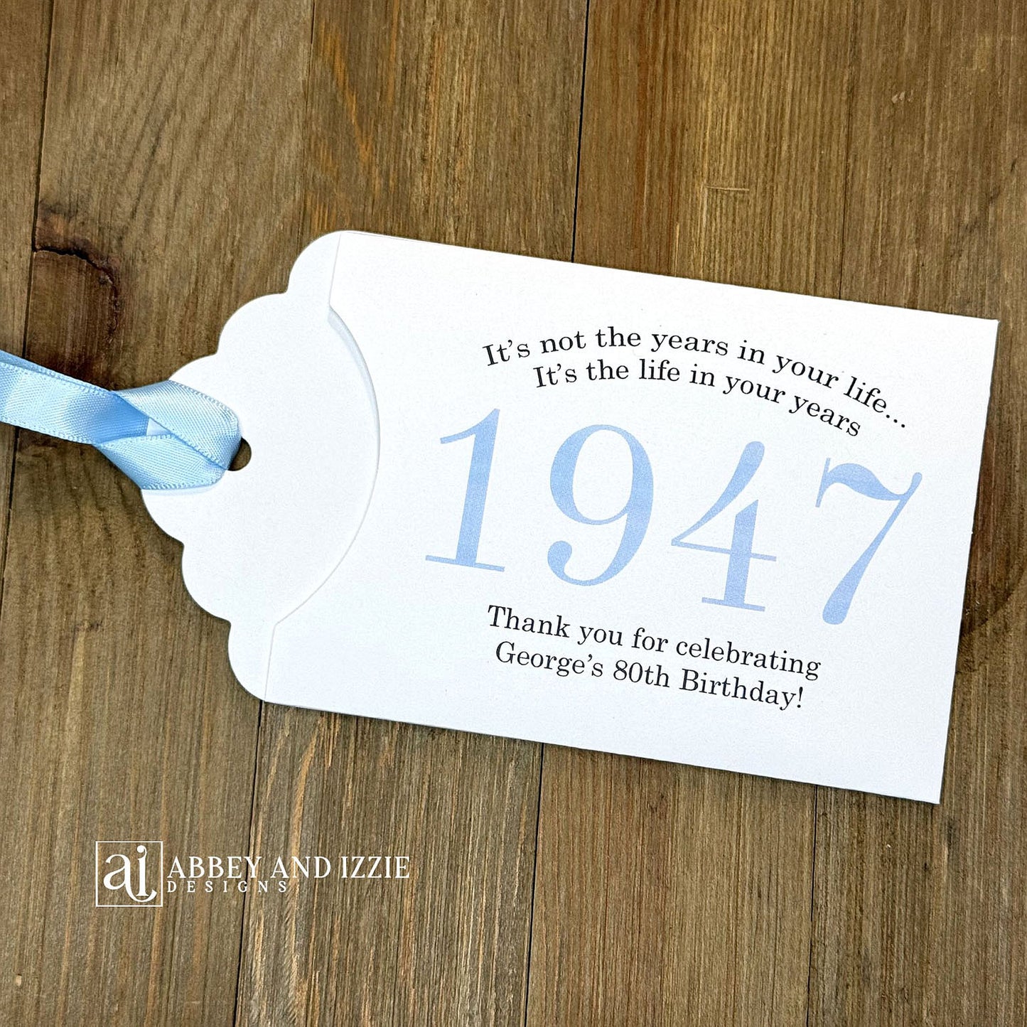 Personalized scratch-off birthday favors for adults. Each envelope features a special message with the year the guest of honor was born in color. Including a thank you for celebrating with the us. Works for milestone birthdays, adult parties, and special events see our store for more options. Constructed from white high-quality cardstock with your choice of year color and ribbon color, which comes attached.