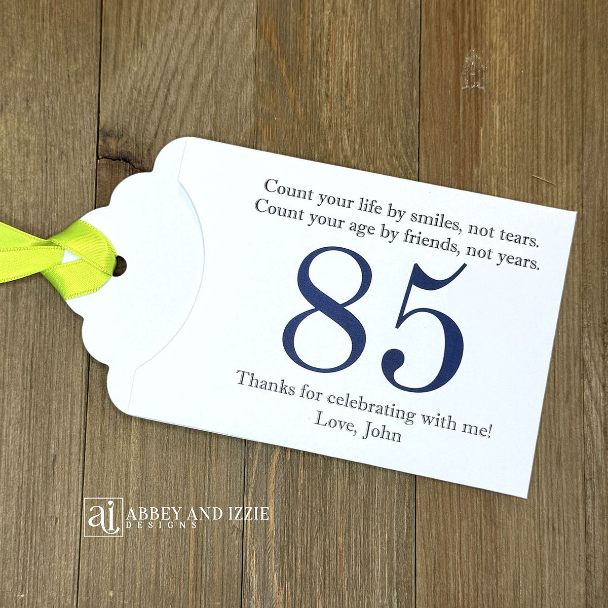 Celebrate with milestone birthday party guest favors that they will treasure. Each favor is customized with names, dates and a special messages to make your event unforgettable. Perfect for 30th, 40th, 50th, and beyond—these keepsakes add a personal touch to any milestone celebration.&nbsp; &nbsp;Printed on white cardstock with your choice of large number and ribbon color to match your party theme.