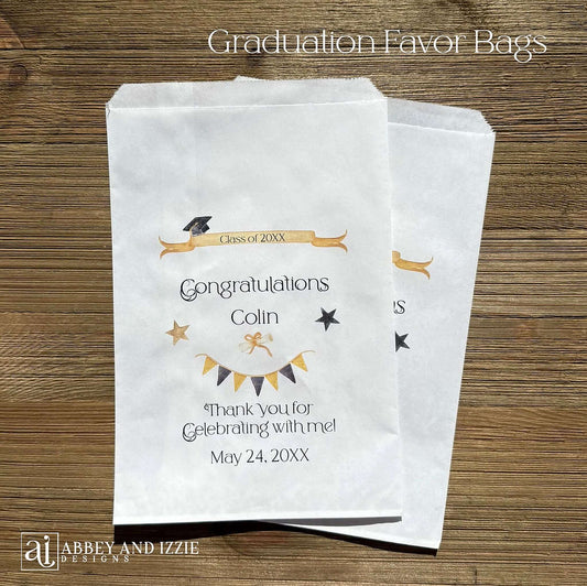 Personalized graduation party bags printed on white bags with the graduates name and event date.  Adorned with black and gold stars, flags and grad cap these will be perfect for candy, cookies or utensil bags.