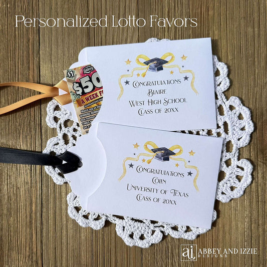 Scratch off Graduation Party Favors, printed on white card stock adorned with gold and black graduation elements.  Personalized for the guest of honor with congratulations.  Choice of black or gold ribbon which comes attahced.  Slide a lotto ticket in the open end of these envelopes for a fun party favor.