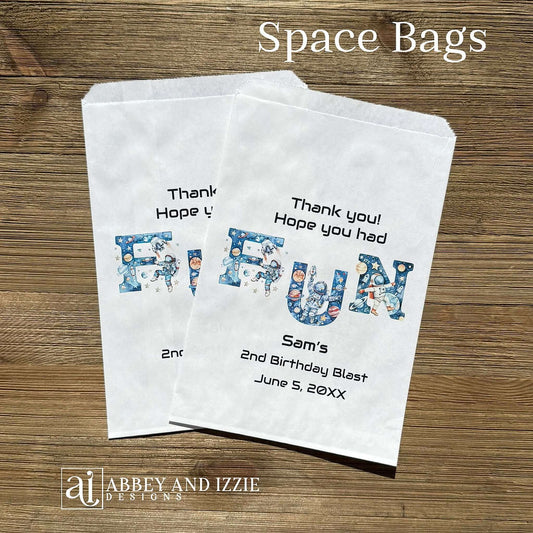 Blast off into party perfection with these Space Birthday Favor Bags! Designed to delight young astronauts and space enthusiasts, each bag features vibrant cosmic imagery including planets, stars, and rockets. Perfect for filling with small toys, candy, or treats, these favor bags add an out-of-this-world touch to any birthday celebration. Printed on white bags and personalized for the guest of honor.  Text 'Thank you!  Hope you had FUN'.