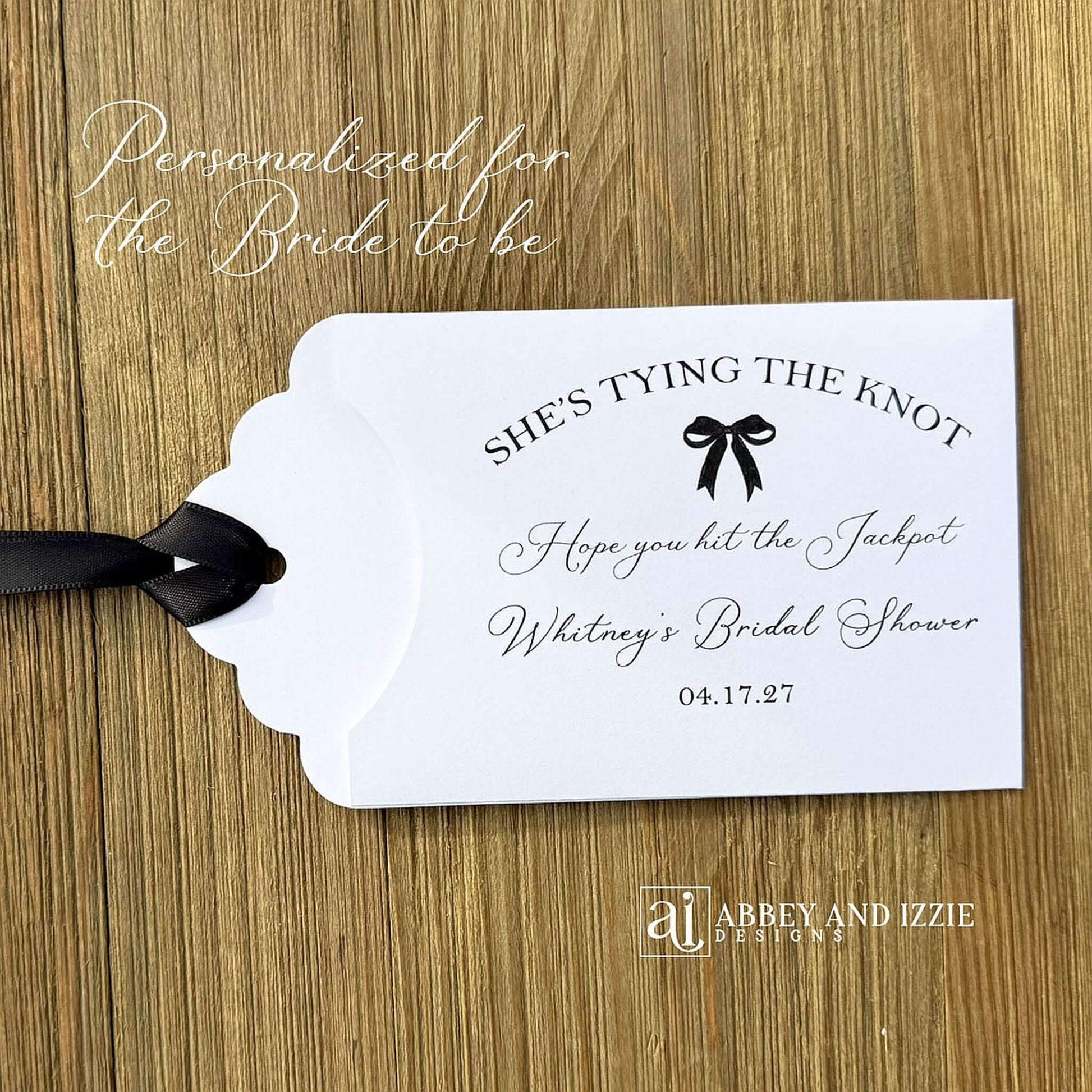 Pink Bow Bridal Shower Guest Favors,&nbsp; Celebrate your bride-to-be with these charming&nbsp; favors that guests will adore&nbsp; Each favor can be customized with names, date, She's Tying the Knot, Hope you hit the Jackpot.&nbsp; Printed on white card stock,&nbsp; your choice of pink or black bow.