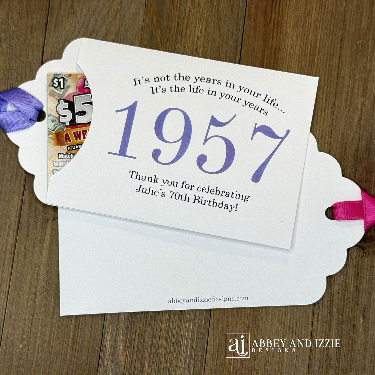 Personalized scratch-off birthday favors for adults. Each envelope features a special message with the year the guest of honor was born in color. Including a thank you for celebrating with the us. Works for milestone birthdays, adult parties, and special events see our store for more options. Constructed from white high-quality cardstock with your choice of year color and ribbon color, which comes attached.