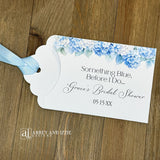 Celebrate the bride-to-be with our Something Blue Bridal Shower Favors—a charming way to honor tradition while delighting your guests. Each favor features beautiful blue hydrangeas, perfect for that 'something blue before I say I do theme'. Personalize with name and date to create a keepsake your guests will treasure. Slide a scratch off card in the open end to add some excitement to the event. Printed on sturdy white card stock with blue ribbon attached. Ideal for adding an elegant touch.