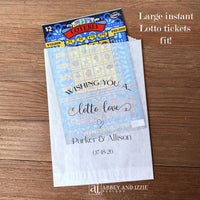 Our glassine bags are personalized and ready to slide a instant lottery ticket in for a fun and memorable wedding favor.  Each is printed with 'Wishing you a lotto love' with the bride and grooms names and wedding date.  