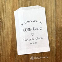Our glassine bags are personalized and ready to slide a instant lottery ticket in for a fun and memorable wedding favor.  Each is printed with 'Wishing you a lotto love' with the bride and grooms names and wedding date.  