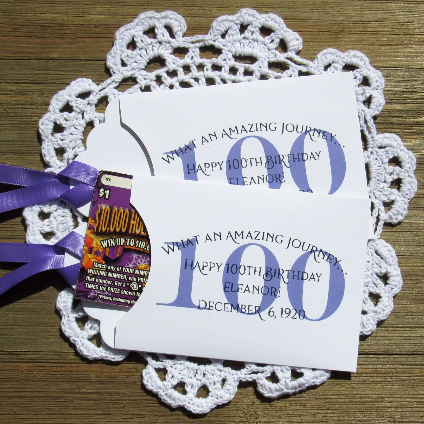 These 100th Birthday Party Favors Personalized  for the honoree with name and birthdate.  Each envelope is printed on white card stock with your choice of colors to match your party theme.  Ribbon comes attached, slide a lottery ticket in the open end and see which guest wins.