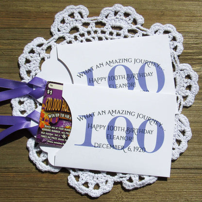These 100th Birthday Party Favors Personalized  for the honoree with name and birthdate.  Each envelope is printed on white card stock with your choice of colors to match your party theme.  Ribbon comes attached, slide a lottery ticket in the open end and see which guest wins.