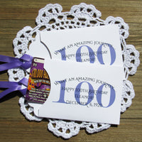 These 100th birthday party favors are personalized for the honoree with name and birthdate.  Each envelope is printed on white card stock with your choice of colors to match your party theme.  Ribbon comes attached, slide a lottery ticket in the open end and see which guest wins.