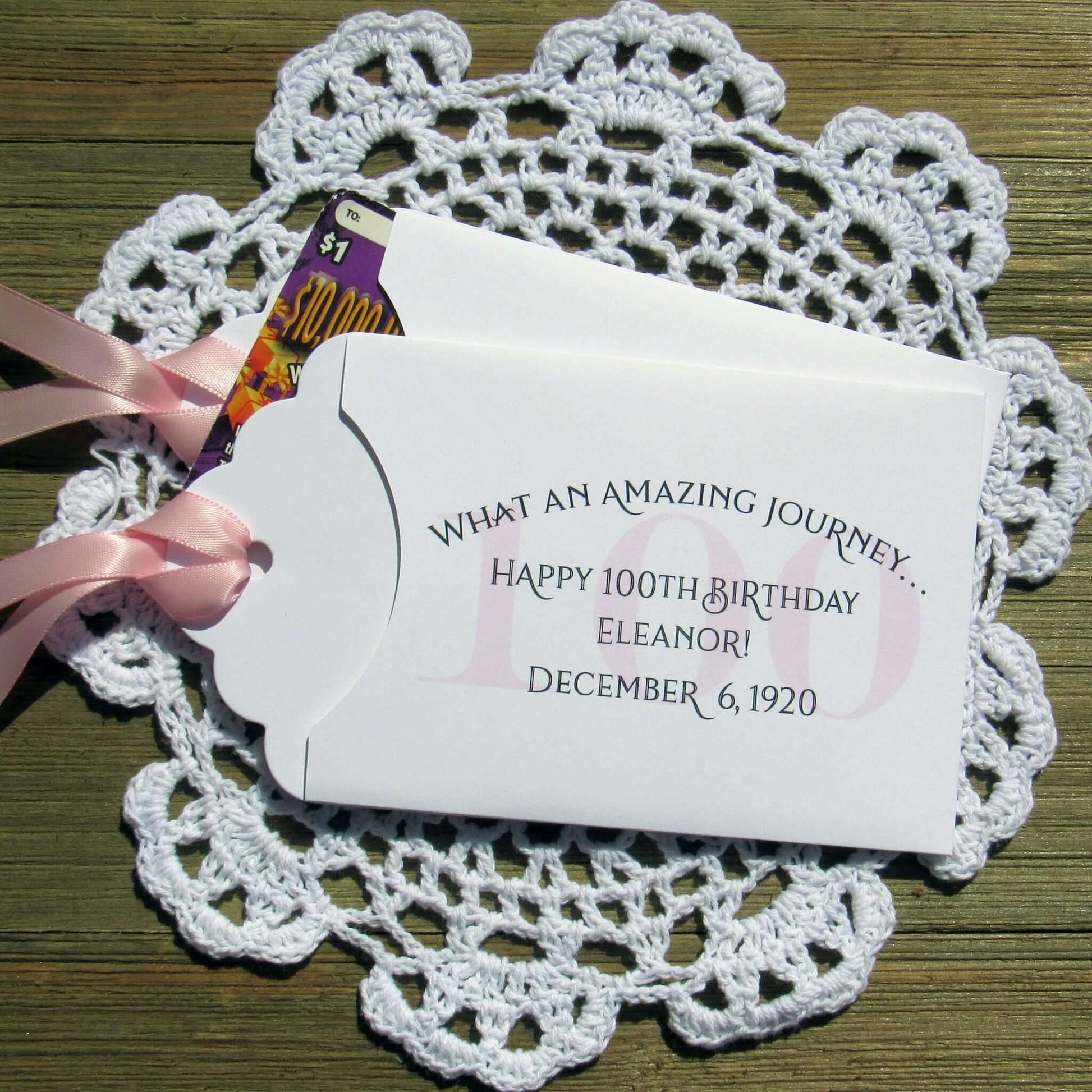 These 100th Birthday Party Favors Personalized  for the honoree with name and birthdate.  Each envelope is printed on white card stock with your choice of colors to match your party theme.  Ribbon comes attached, slide a lottery ticket in the open end and see which guest wins.