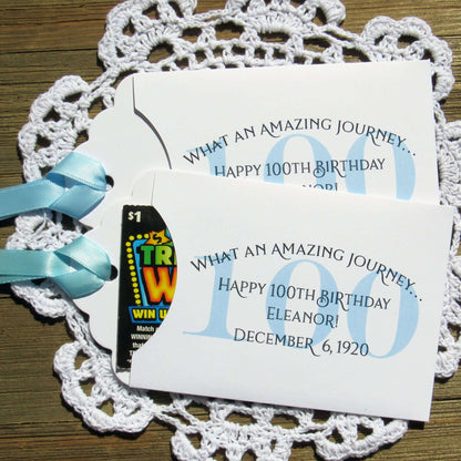 These 100th Birthday Party Favors Personalized  for the honoree with name and birthdate.  Each envelope is printed on white card stock with your choice of colors to match your party theme.  Ribbon comes attached, slide a lottery ticket in the open end and see which guest wins.