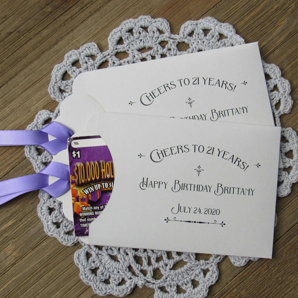 Fun 21st Birthday Party Favors are personalized for the guest of honor, slide a lotto ticket in these cute envelopes to see who goes home a winner.  