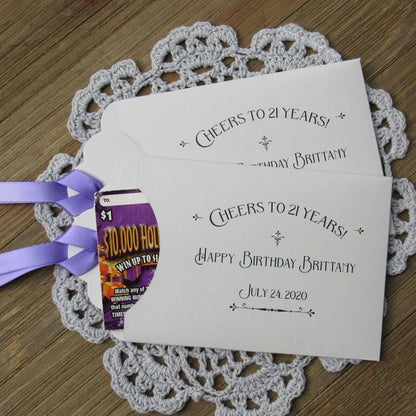 Fun 21st Birthday Party Favors are personalized for the guest of honor, slide a lotto ticket in these cute envelopes to see who goes home a winner.  