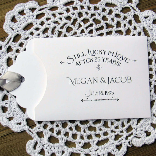 Still Lucky in Love 25th Anniversary Favors, slide a lottery ticket in and see who goes homes with the cash!  Your guests will appreciate these fun and easy silver anniversary party favors.