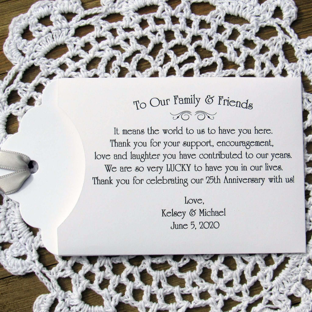 Lottery Ticket Envelopes for Wedding Anniversary Favors, these can be made for any anniversary year.  Shown here for a 25th Anniversary with silver ribbon printed on white envelopes. Slide a scratch off lotto in to see which guests win big