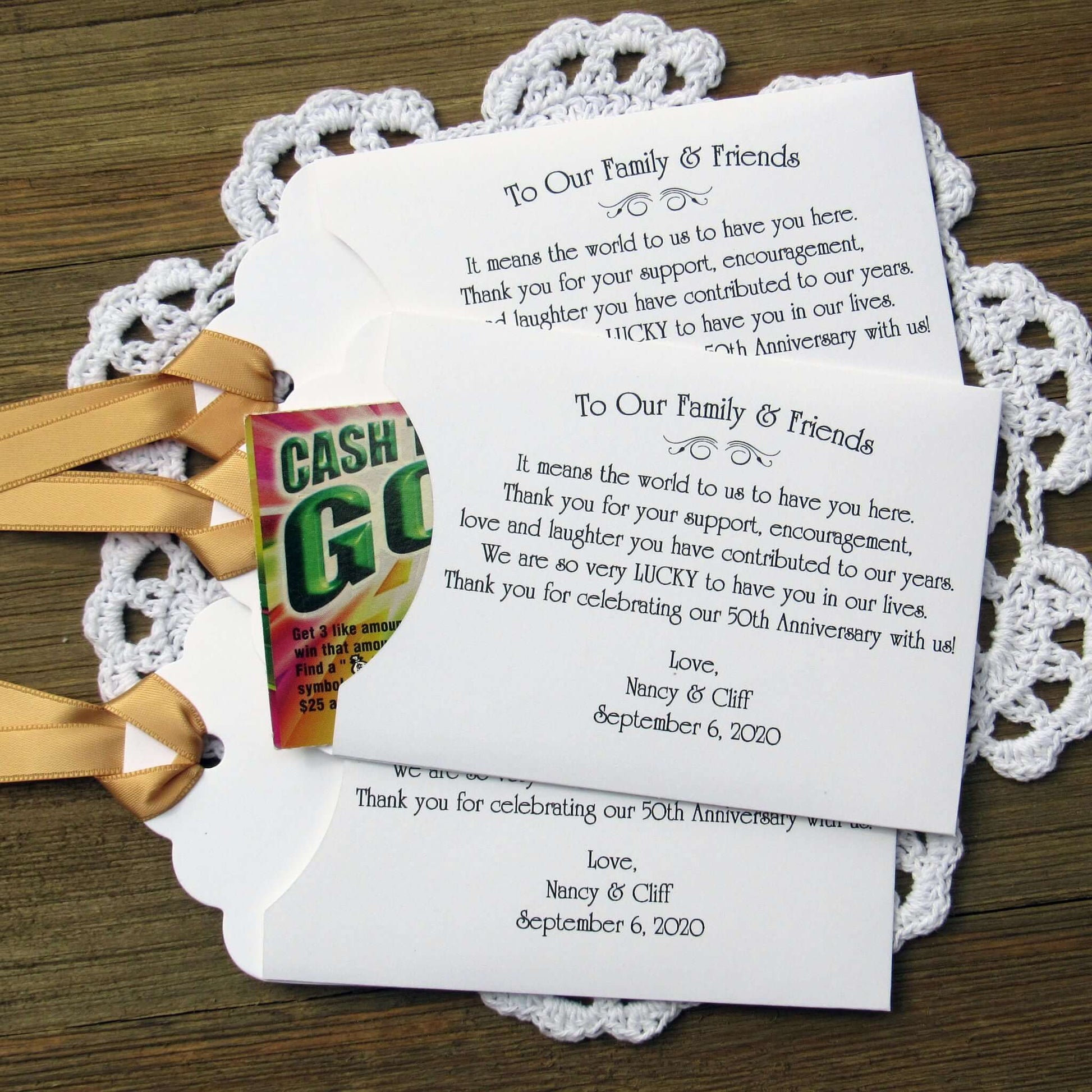 Personalized 50th Wedding Anniversary Party Favors, with a sweet saying to let your friends and family know how much they mean to you.  Printed on white envelopes with a gold ribbon attached.  