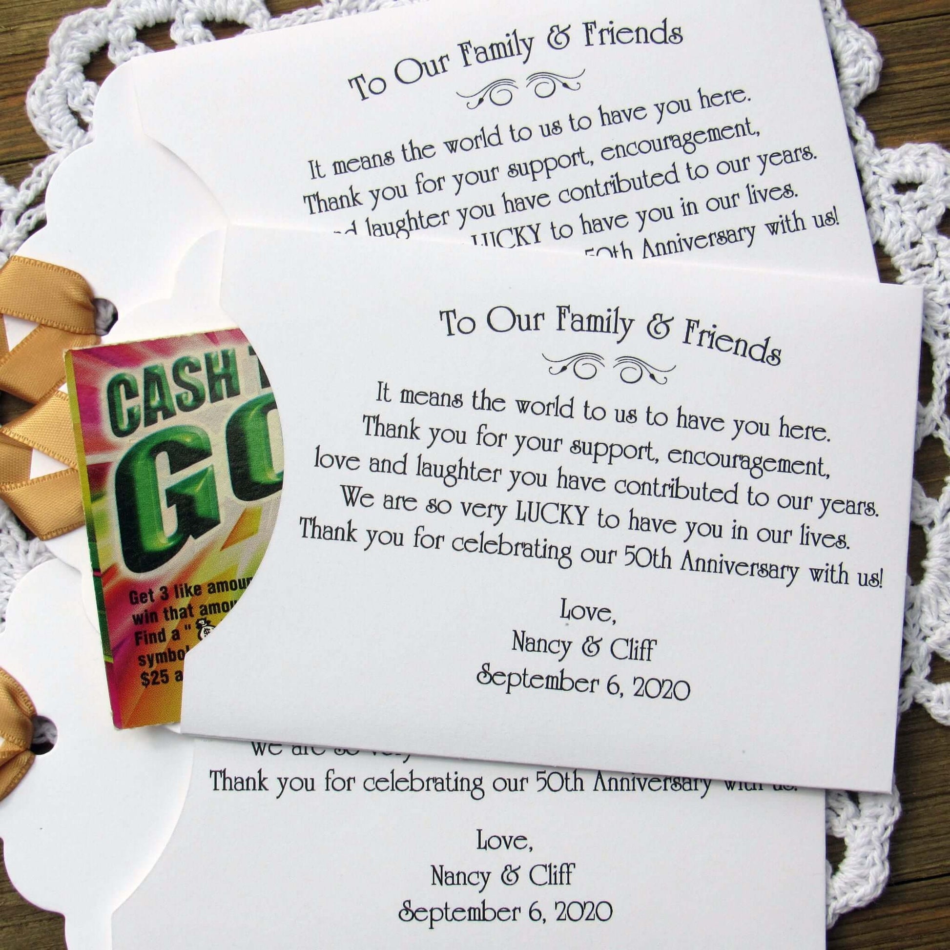 Personalized 50th Wedding Anniversary Party Favors, with a sweet saying to let your friends and family know how much they mean to you.  Printed on white envelopes with a gold ribbon attached.  