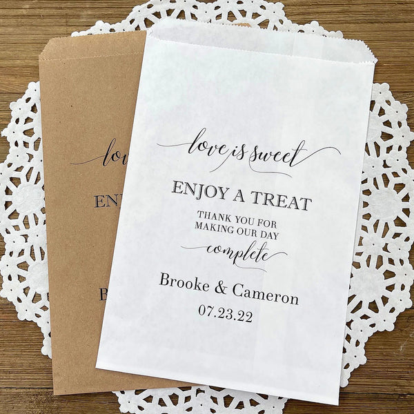 Love is Sweet enjoy a treat wedding candy bags, personalized for the bride and groom.  Your choice of white or brown bags, perfect size bags for a candy buffet.
