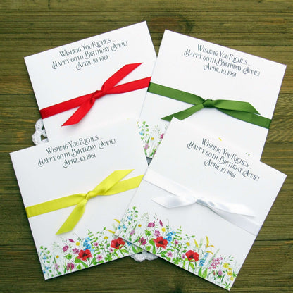Adult Personalized Birthday Lottery Ticket Favors, slide a lotto ticket in these cute envelopes for a fun party favor.  Personalized with 'wishing you riches' and happy birthday to the guest of honor.  Adorned with wildflowers with your choice of coordinating ribbon.