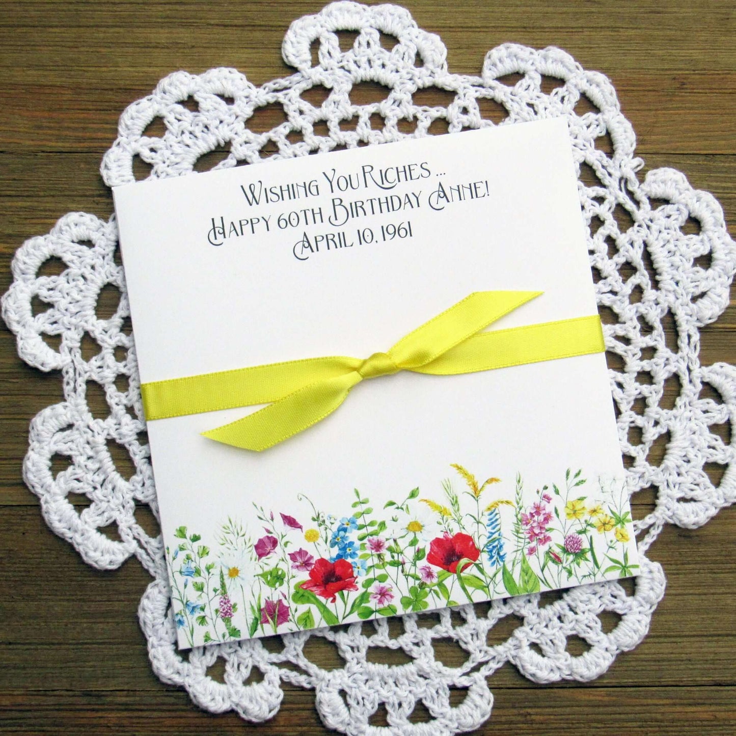 Adult Personalized Birthday Lottery Ticket Favors, slide a lotto ticket in these cute envelopes for a fun party favor.  Personalized with 'wishing you riches' and happy birthday to the guest of honor.  Adorned with wildflowers with your choice of coordinating ribbon.