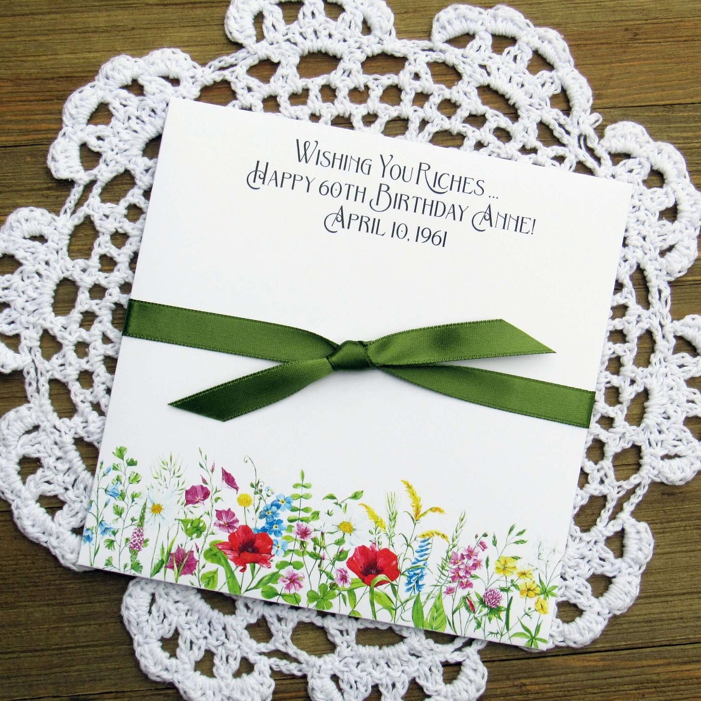 Adult Personalized Birthday Lottery Ticket Favors, slide a lotto ticket in these cute envelopes for a fun party favor.  Personalized with 'wishing you riches' and happy birthday to the guest of honor.  Adorned with wildflowers with your choice of coordinating ribbon.