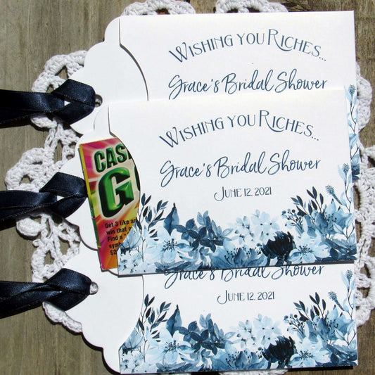 Navy Blue Bridal Shower Favors, personalized for the bride to be.  Small white envelopes adorned with navy flowers printed and a navy ribbon.  Slide a lotto ticket in for a fun bridal shower favor. 