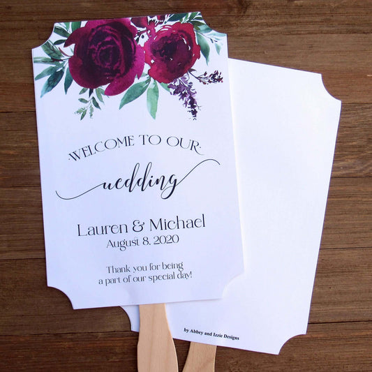 Burgundy Personalized Wedding Fans with the bride and grooms name and wedding date.  Printed on white card stock, two side with handle hidden between, printing on one side only.  Shipped to you assembled and ready for your special day.