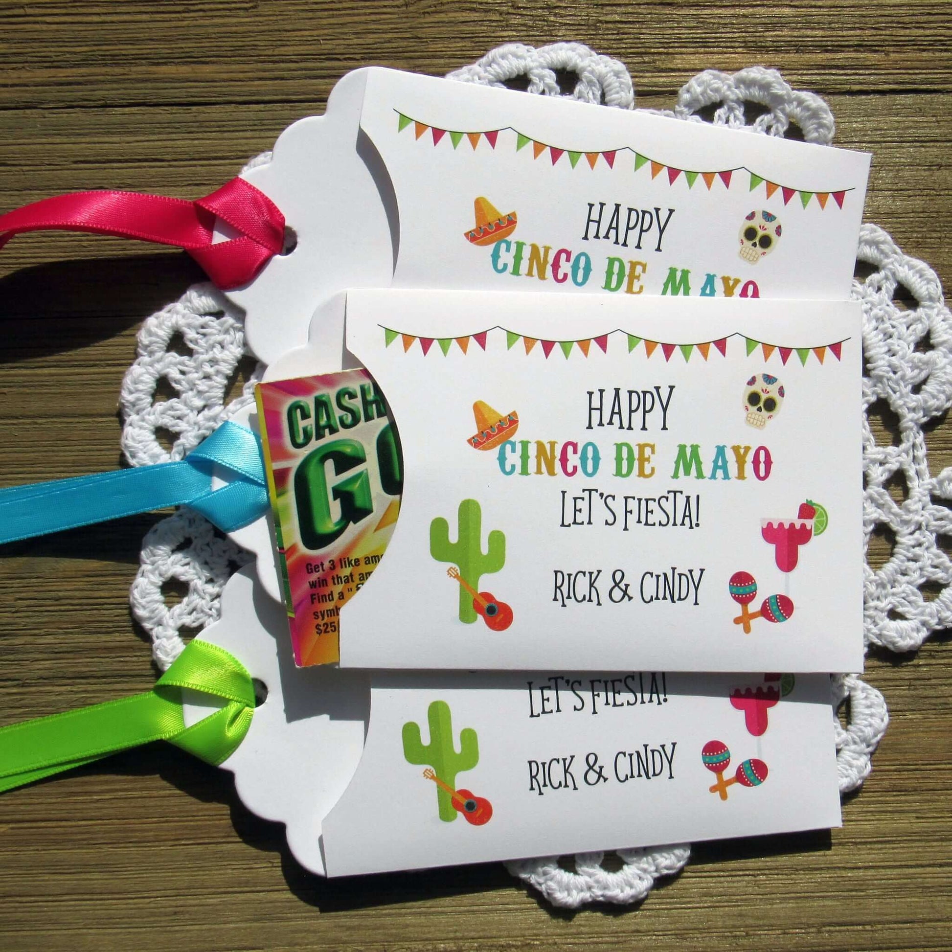 Cinco De Mayo Party Favors featuring vibrant designs, lottery tickets, and colorful ribbons for festive celebrations.
