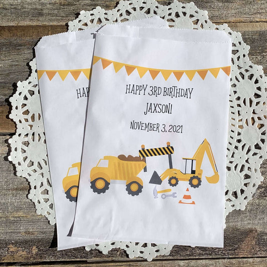 Construction Birthday Favor Bags personalized for the guest of honor!  Printed on white bags with large construction equipment, these are perfect size for any treats.  