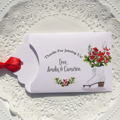 Winter Wedding Favors Personalized for the bride and groom.  Printed on white envelopes with red ribbon attached.  Slide a lottery ticket in to see which guest wins.