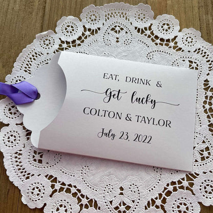 Eat Drink & Get Lucky Lotto Ticket Favors Personalized  envelopes, slide a scratch off lotto ticket in for fun and easy wedding guest favors.  Choice of envelope and ribbon color.