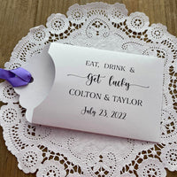 Eat, Drink & Get Lucky lotto ticket wedding favors.  Personalized lottery ticket envelopes, slide a scratch off lotto ticket in for fun and easy wedding guest favors.  Choice of envelope and ribbon color.