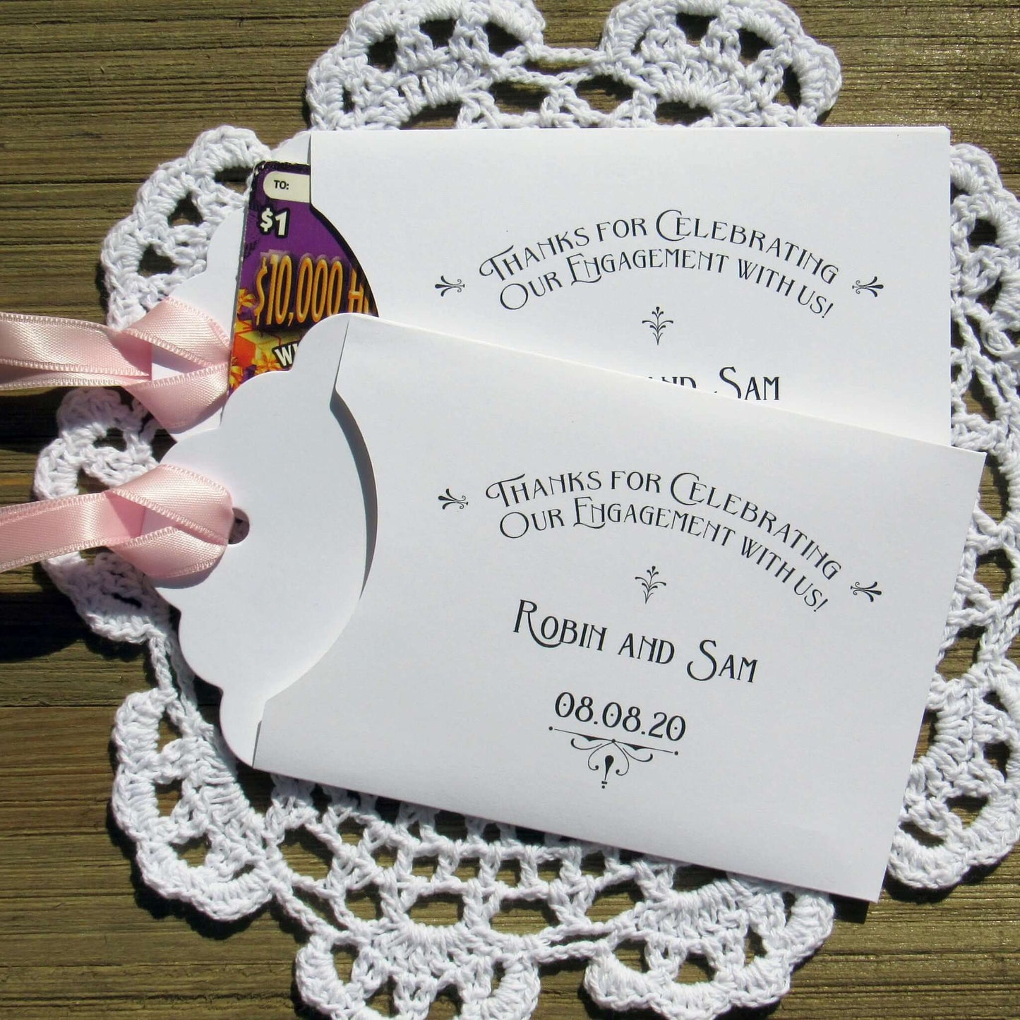 Personalized Engagement Party Favors slide a lottery ticket in the envelope and see who wins big at your engagement party.  Your choice of envelope and ribbon color.  Ribbon included and comes attached.