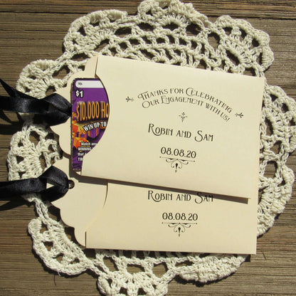 Personalized Engagement Party Favors slide a lottery ticket in the envelope and see who wins big at your engagement party.  Your choice of envelope and ribbon color.  Ribbon included and comes attached.