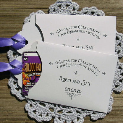Personalized Engagement Party Favors slide a lottery ticket in the envelope and see who wins big at your engagement party.  Your choice of envelope and ribbon color.  Ribbon included and comes attached.