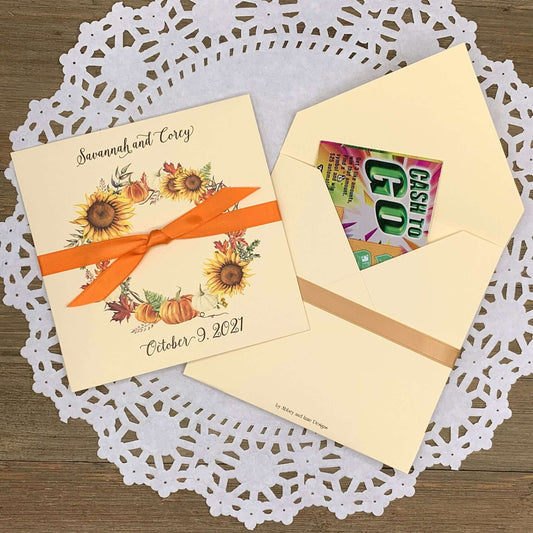 Fall Wedding Guest Favors Personalized for the happy couple.  Printed on ivory card stock with a beautiful fall wreath your choice of ribbon color.  Slide a lotto ticket or custom coaster in these for a faun wedding favor.