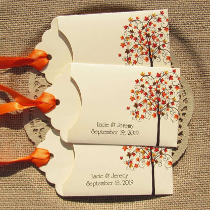 Fall Tree Wedding Guest Favors Personalized for your special day.  Lottery ticket envelopes for wedding favors, slide a lotto ticket in the open end to see who wins.  Envelopes are printed on ivory card stock with ribbon attached.  Adorned with a fall tree for some autumn color.