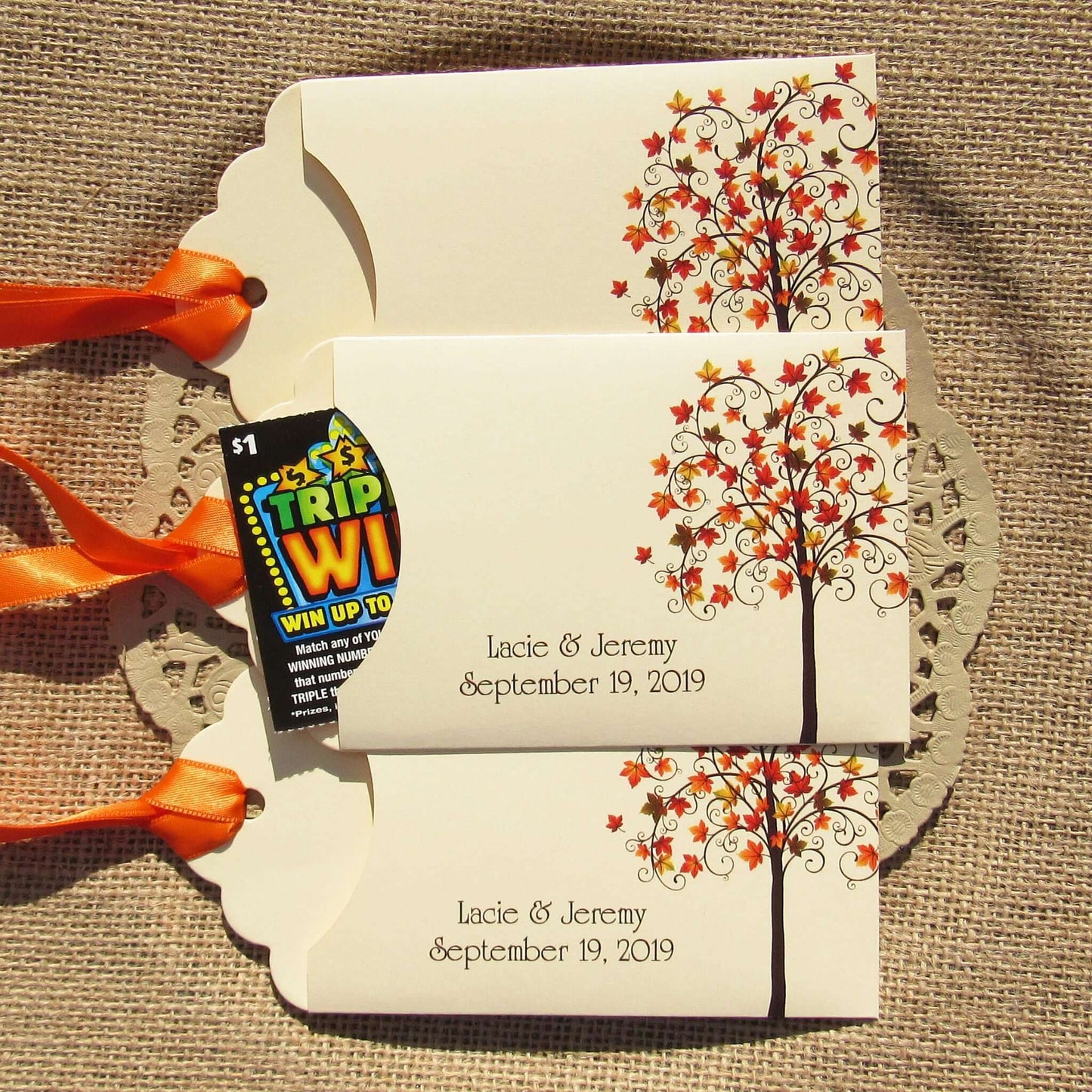 Fall Tree Wedding Guest Favors Personalized for your special day.  Lottery ticket envelopes for wedding favors, slide a lotto ticket in the open end to see who wins.  Envelopes are printed on ivory card stock with ribbon attached.  Adorned with a fall tree for some autumn color.