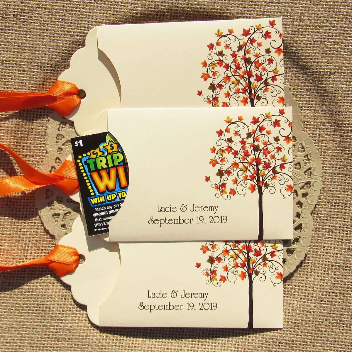 Fall Tree Wedding Guest Favors Personalized for your special day.  Lottery ticket envelopes for wedding favors, slide a lotto ticket in the open end to see who wins.  Envelopes are printed on ivory card stock with ribbon attached.  Adorned with a fall tree for some autumn color.