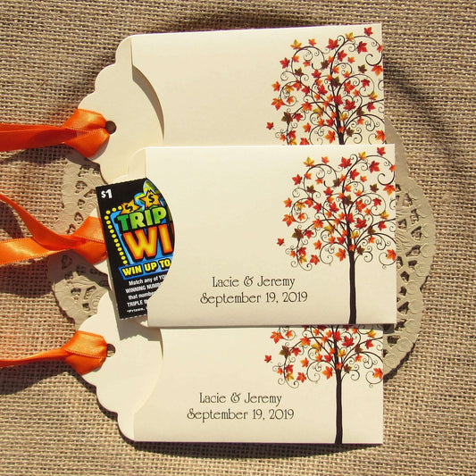 Fall Tree Wedding Guest Favors Personalized for your special day.  Lottery ticket envelopes for wedding favors, slide a lotto ticket in the open end to see who wins.  Envelopes are printed on ivory card stock with ribbon attached.  Adorned with a fall tree for some autumn color.