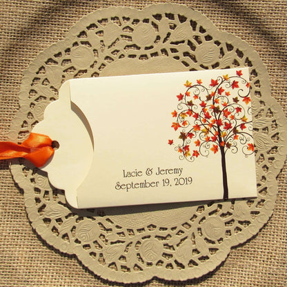 Fall Tree Wedding Guest Favors Personalized for your special day.  Lottery ticket envelopes for wedding favors, slide a lotto ticket in the open end to see who wins.  Envelopes are printed on ivory card stock with ribbon attached.  Adorned with a fall tree for some autumn color.