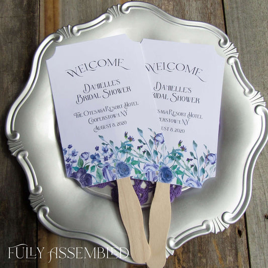 Lavender Bridal Shower Fans, personalized for the bride to be.  Printed on white card stock with wooden handle hidden between, adorned with lavender flowers.
