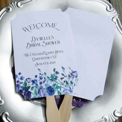 Lavender Bridal Shower Fans, personalized for the bride to be.  Printed on white card stock with wooden handle hidden between, adorned with lavender flowers.