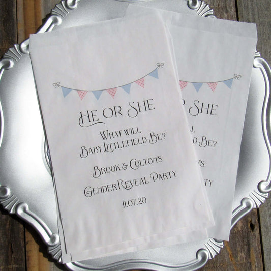 Gender Reveal Party Bags, he or she what will it be?  Printed on white bags in blue and pink these can be filled to the brim with cookies, candy, popcorn any treat you desire.  
