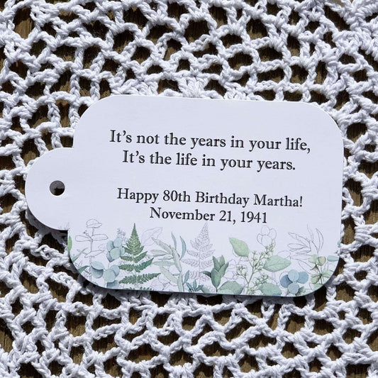 Adult Birthday Favor Tags personalized for the guest of honor. Adorned with greenery for a soft touch.